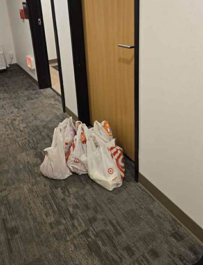 Grocery bags at hotel room door